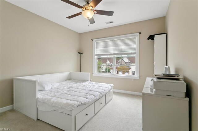 705 Braemar Crk, Williamsburg, VA 23188 - bedroom with light colored carpet and a ceiling fan