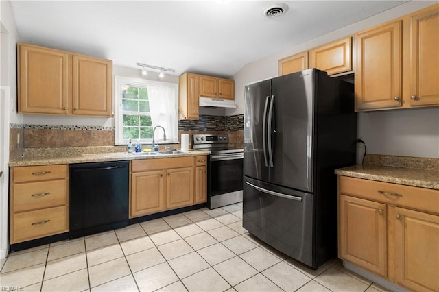 127 Robinson Dr, Newport News, VA 23601 - kitchen featuring black dishwasher, freestanding refrigerator, stainless steel electric stove, under cabinet range hood, and light countertops