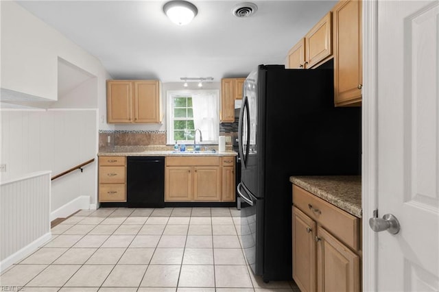 127 Robinson Dr, Newport News, VA 23601 - kitchen with black appliances, light brown cabinets, and light tile patterned floors