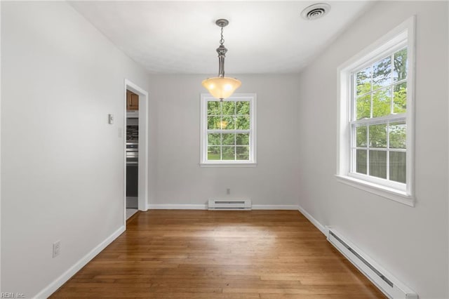 127 Robinson Dr, Newport News, VA 23601 - unfurnished room featuring a baseboard radiator, a baseboard heating unit, and hardwood / wood-style flooring