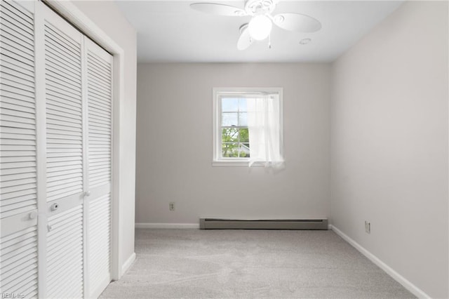 127 Robinson Dr, Newport News, VA 23601 - unfurnished bedroom featuring a baseboard radiator, a closet, carpet floors, and ceiling fan