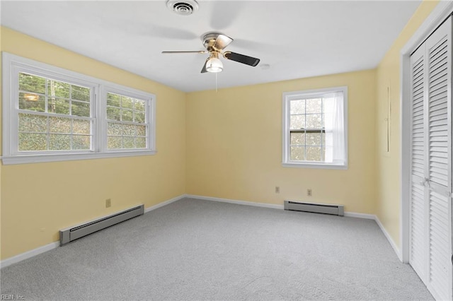 127 Robinson Dr, Newport News, VA 23601 - unfurnished bedroom with a baseboard heating unit, carpet, a closet, and ceiling fan