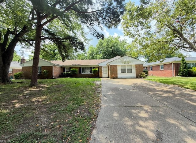 5309 S Palmyra Dr, Virginia Beach, VA 23462 - ranch-style house with driveway, brick siding, and a front yard