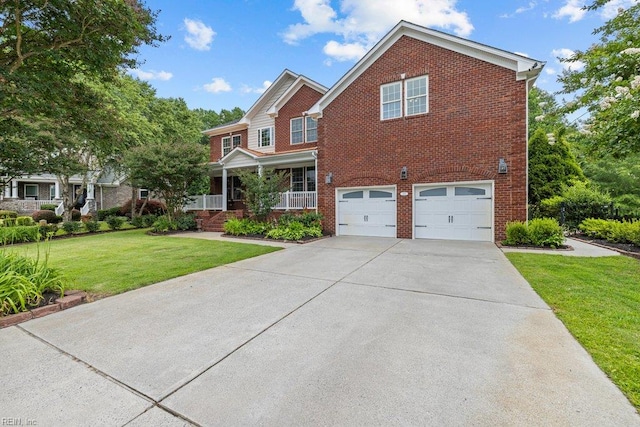 205 Napoli Ct, Chesapeake, VA 23322 - view of front of home featuring brick siding, a porch, a garage, and driveway