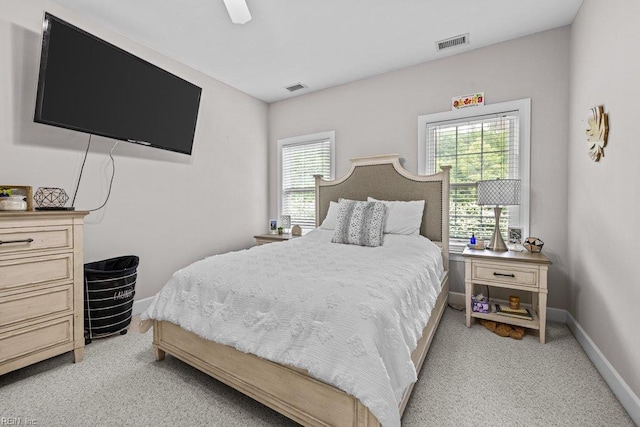 205 Napoli Ct, Chesapeake, VA 23322 - bedroom with light carpet, multiple windows, and a ceiling fan