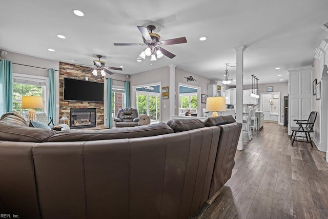205 Napoli Ct, Chesapeake, VA 23322 - living area featuring recessed lighting, a ceiling fan, a stone fireplace, and wood finished floors