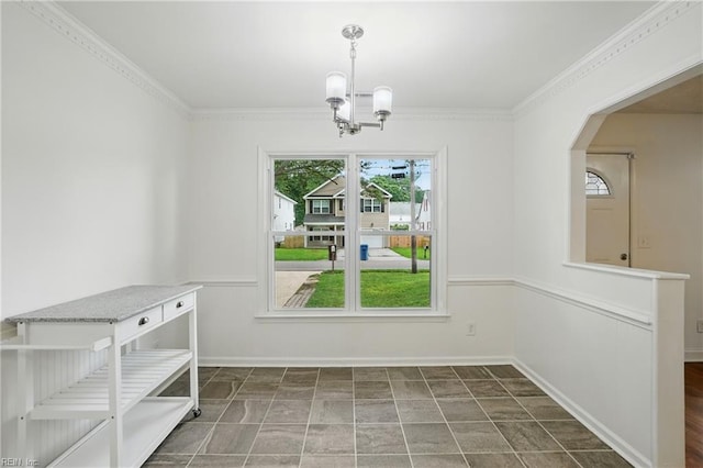 1207 Hazel Ave, Chesapeake, VA 23325 - unfurnished dining area featuring a chandelier, arched walkways, and crown molding