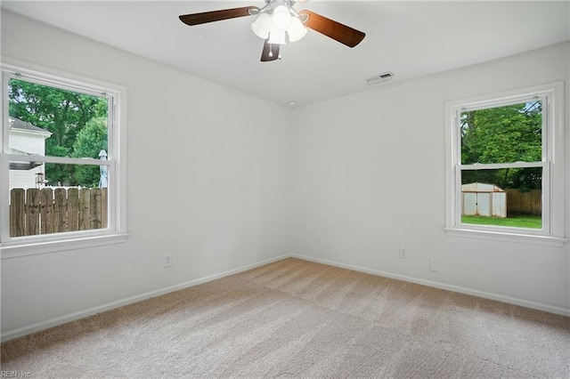 1207 Hazel Ave, Chesapeake, VA 23325 - carpeted spare room with baseboards and ceiling fan