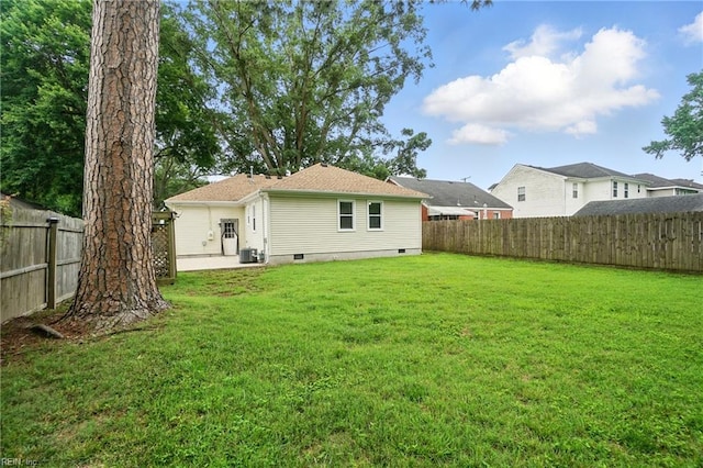 1207 Hazel Ave, Chesapeake, VA 23325 - rear view of property with a fenced backyard, crawl space, and a patio