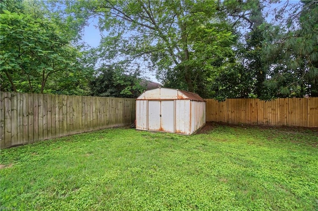 1207 Hazel Ave, Chesapeake, VA 23325 - fenced backyard with a shed