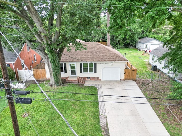 1207 Hazel Ave, Chesapeake, VA 23325 - view of front of property featuring a garage, driveway, and a shingled roof