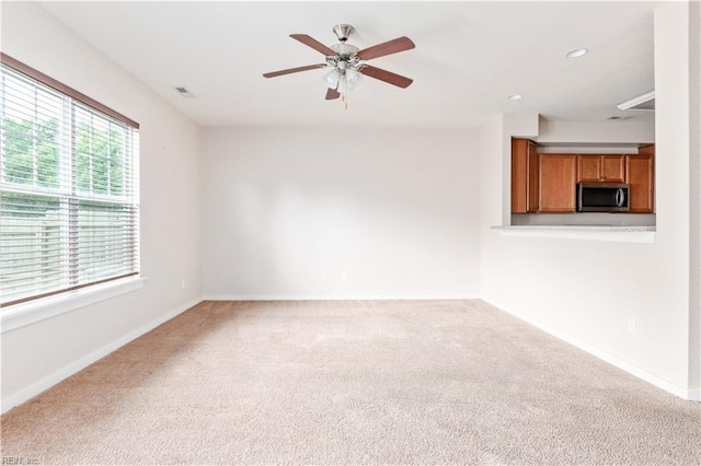 222 Craftsman Cir, Suffolk, VA 23434 - unfurnished living room with carpet, a ceiling fan, and recessed lighting