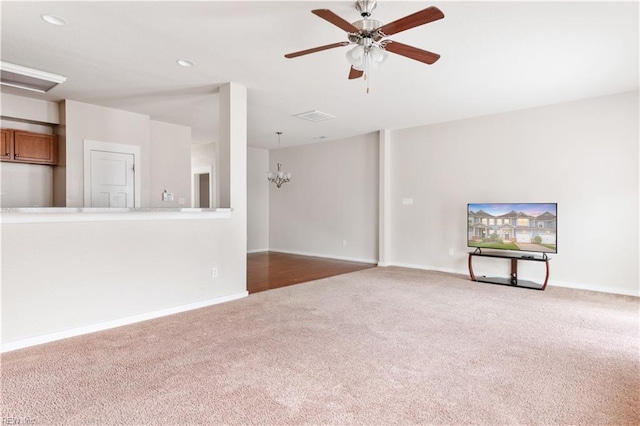 222 Craftsman Cir, Suffolk, VA 23434 - unfurnished living room featuring carpet, a ceiling fan, a chandelier, and recessed lighting