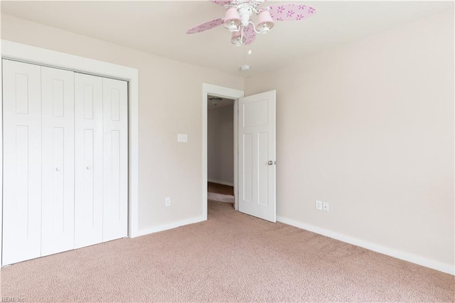 222 Craftsman Cir, Suffolk, VA 23434 - unfurnished bedroom featuring light colored carpet, a closet, and a ceiling fan