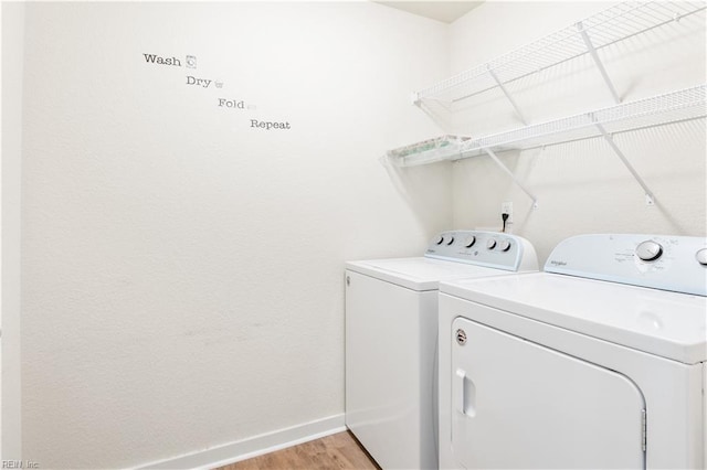 222 Craftsman Cir, Suffolk, VA 23434 - washroom featuring washing machine and dryer and light wood-style flooring