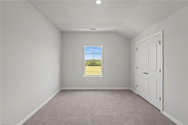 2013 Munro Ln, Chesapeake, VA 23322 - unfurnished bedroom with carpet flooring and lofted ceiling