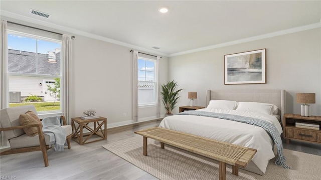 2017 Munro Ln, Chesapeake, VA 23322 - bedroom with ornamental molding, light wood-style floors, and recessed lighting