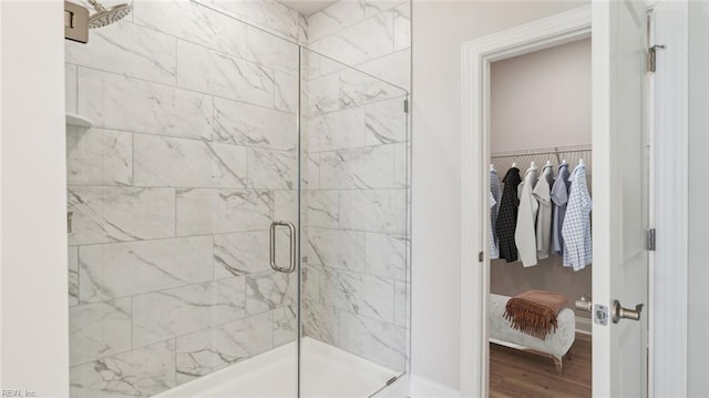 2017 Munro Ln, Chesapeake, VA 23322 - bathroom with a stall shower, wood finished floors, and a spacious closet