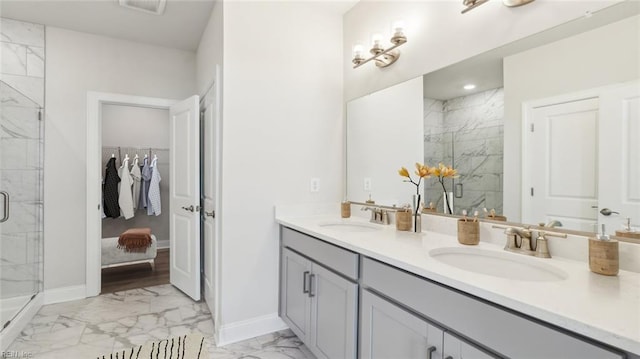2017 Munro Ln, Chesapeake, VA 23322 - bathroom with marble finish floors, a marble finish shower, double vanity, and a walk in closet