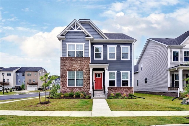 134 Fishermans Way, Poquoson, VA 23662 - view of front of property with brick siding and a front lawn