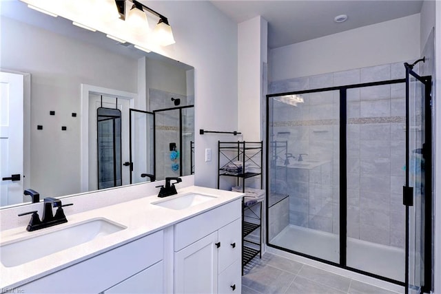 134 Fishermans Way, Poquoson, VA 23662 - bathroom with a stall shower, double vanity, and tile patterned flooring