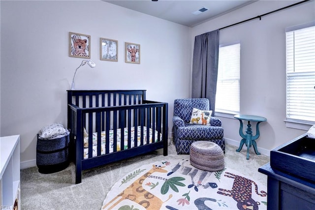 134 Fishermans Way, Poquoson, VA 23662 - carpeted bedroom with baseboards and a crib
