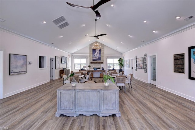 134 Fishermans Way, Poquoson, VA 23662 - living room with ceiling fan, a fireplace, wood finished floors, recessed lighting, and crown molding