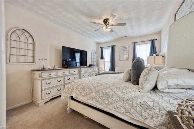 6729 Hampton Roads Pkwy Unit D, Suffolk, VA 23435 - bedroom with light colored carpet and a ceiling fan