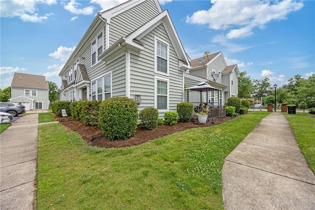 6729 Hampton Roads Pkwy Unit D, Suffolk, VA 23435 - view of property exterior featuring a lawn