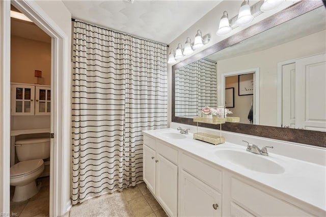 6729 Hampton Roads Pkwy Unit D, Suffolk, VA 23435 - bathroom with double vanity and tile patterned flooring
