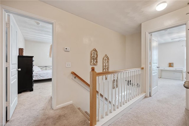 6729 Hampton Roads Pkwy Unit D, Suffolk, VA 23435 - hallway featuring carpet floors and an upstairs landing