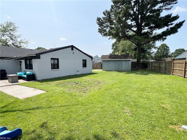 969 Westerly Trl, Virginia Beach, VA 23464 - fenced backyard featuring a patio, an outdoor living space, and a storage shed