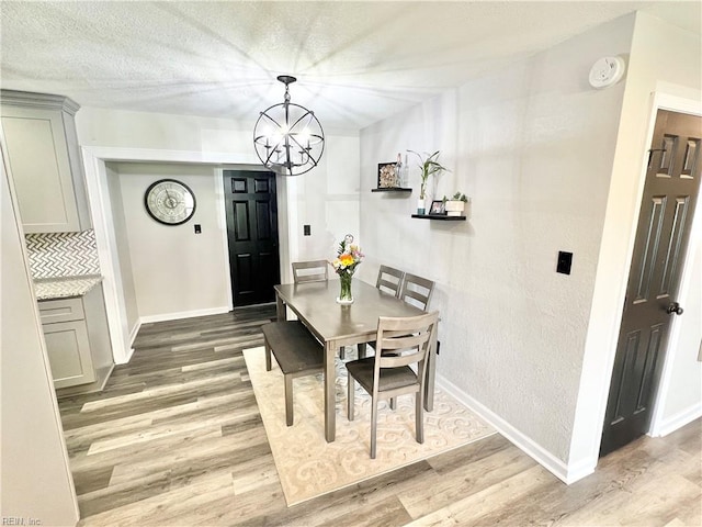 969 Westerly Trl, Virginia Beach, VA 23464 - dining room with light wood-style floors and a chandelier