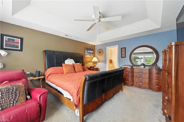 106 Genoa Dr, Hampton, VA 23664 - bedroom with a raised ceiling, light carpet, ensuite bath, and a ceiling fan