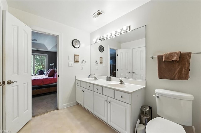106 Genoa Dr, Hampton, VA 23664 - ensuite bathroom with double vanity and tile patterned floors