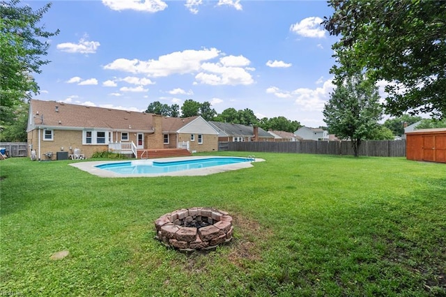 3419 Filly Run, Chesapeake, VA 23323 - view of swimming pool featuring an outdoor fire pit, a fenced backyard, and a deck
