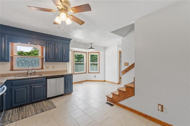 3419 Filly Run, Chesapeake, VA 23323 - kitchen with stainless steel dishwasher, blue cabinets, ceiling fan, light tile patterned floors, and stove