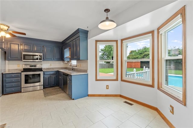 3419 Filly Run, Chesapeake, VA 23323 - kitchen with appliances with stainless steel finishes, decorative backsplash, and healthy amount of natural light