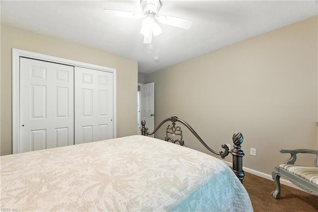 2152 Benomi Dr, Williamsburg, VA 23185 - bedroom featuring dark colored carpet, a closet, and ceiling fan