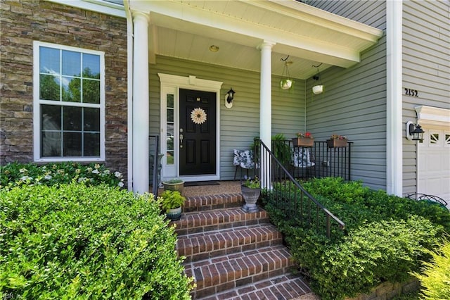 2152 Benomi Dr, Williamsburg, VA 23185 - view of exterior entry with stone siding and covered porch