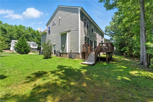 2152 Benomi Dr, Williamsburg, VA 23185 - view of side of home with a wooden deck and a lawn