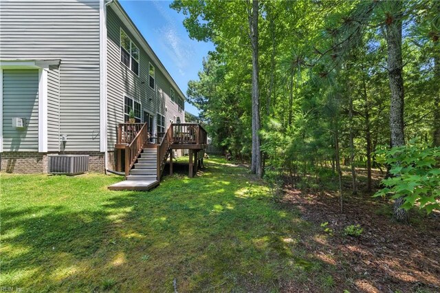 2152 Benomi Dr, Williamsburg, VA 23185 - view of grassy yard featuring a deck and stairway