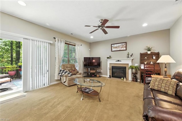 2152 Benomi Dr, Williamsburg, VA 23185 - living area featuring carpet flooring, a glass covered fireplace, a ceiling fan, and recessed lighting