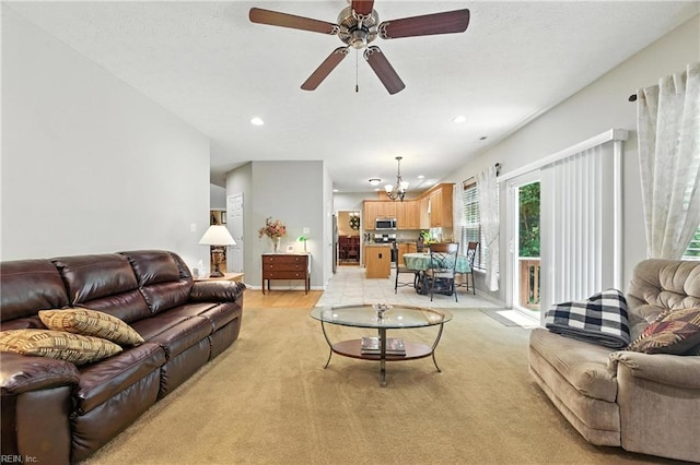 2152 Benomi Dr, Williamsburg, VA 23185 - living room featuring a chandelier, recessed lighting, light colored carpet, and a ceiling fan