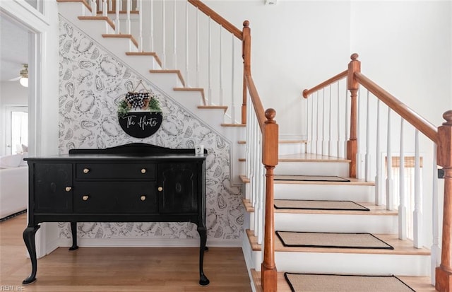 119 Grand View Dr, Hampton, VA 23664 - staircase with wood finished floors, a ceiling fan, and wallpapered walls