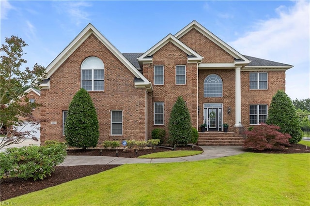 860 Greenfield Ln, Chesapeake, VA 23322 - view of front facade with a front lawn and brick siding