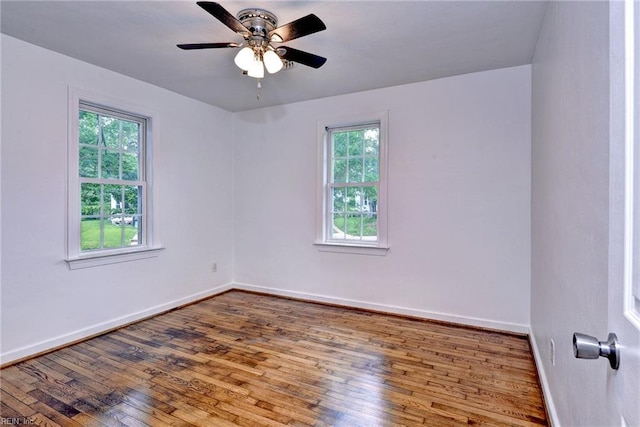 513 W Maynor Dr, Williamsburg, VA 23185 - spare room featuring wood finished floors and ceiling fan