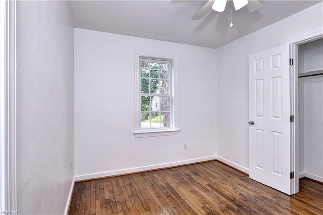 513 W Maynor Dr, Williamsburg, VA 23185 - unfurnished bedroom featuring dark wood finished floors and a ceiling fan