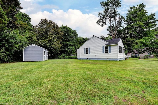 513 W Maynor Dr, Williamsburg, VA 23185 - view of grassy yard featuring a storage unit