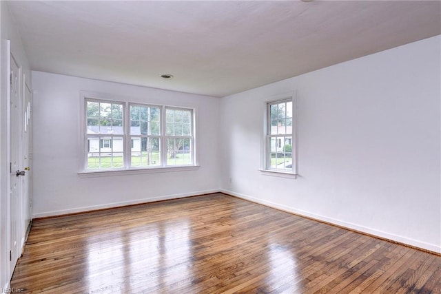 513 W Maynor Dr, Williamsburg, VA 23185 - unfurnished room featuring wood-type flooring and baseboards